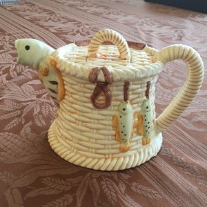 Collectible porcelain teapot fish and basket.
